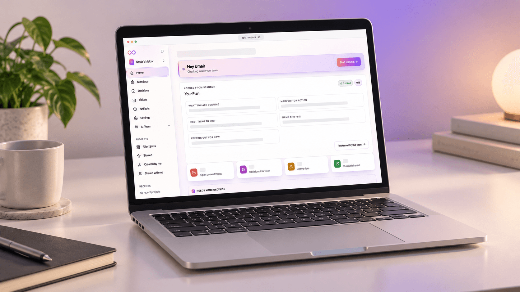The signed-in Melcor AI workspace in a laptop, with navigation for standups, decisions, tickets, artifacts, and the AI team